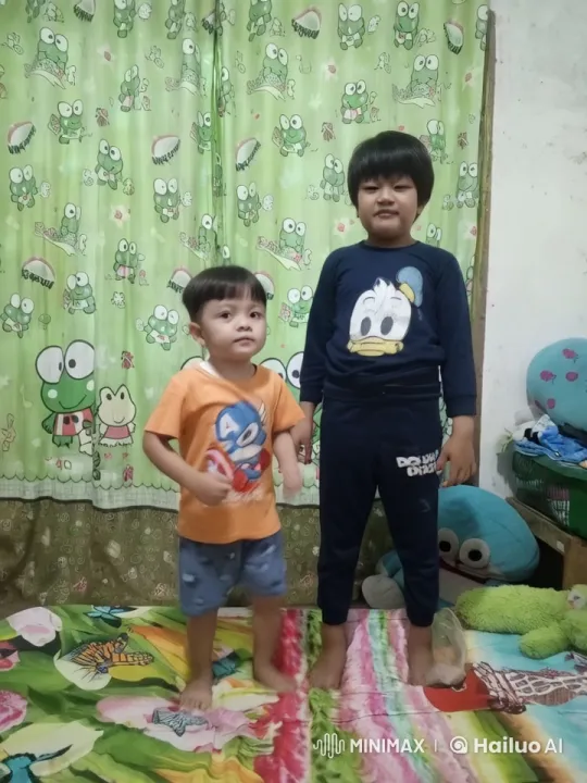 Children's Imaginative Kungfu Duel on Colorful Bedspread – AI Generated Video | Hailuo AI