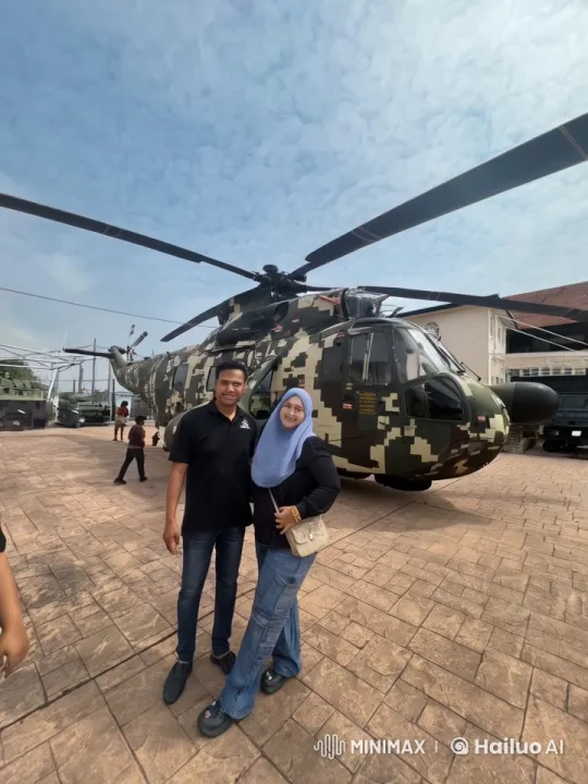Couple Poses with Helicopter in Open Field – AI Generated Video | Hailuo AI