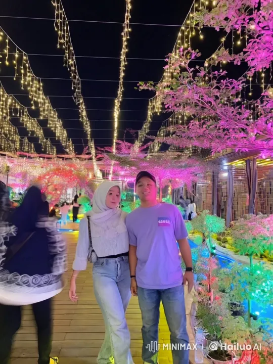 Martial Arts Duo Battles on Lively Lighted Boardwalk – AI Generated Video | Hailuo AI