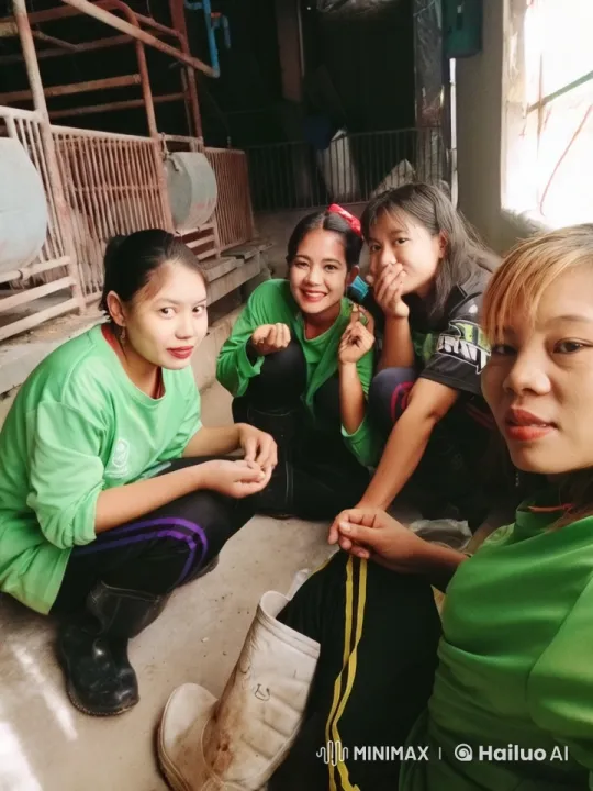 Women Chatting in Industrial Setting During Break – AI Generated Video | Hailuo AI