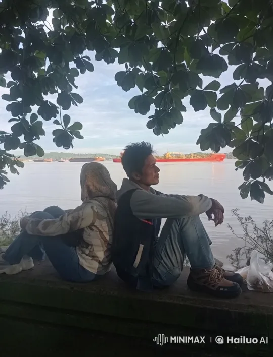 Casual Duo Reflects on Calm Waterside Scene – AI Generated Video | Hailuo AI