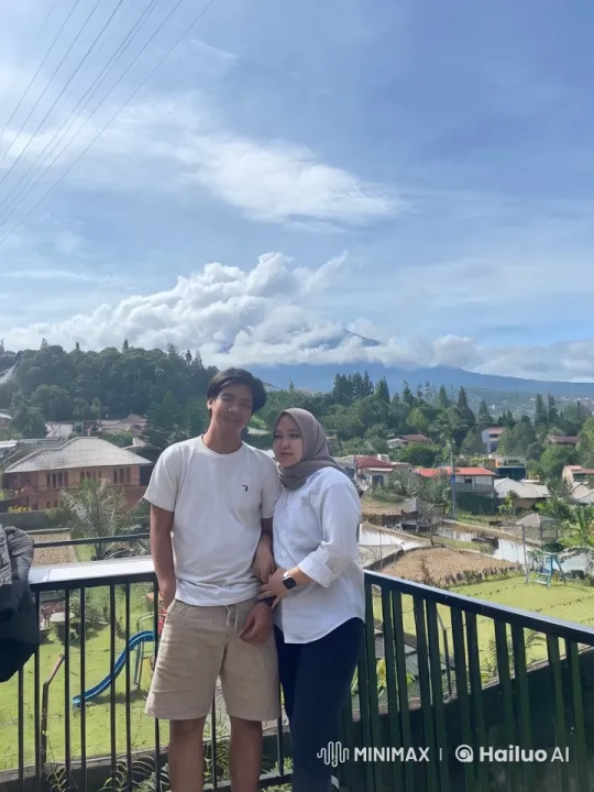 Young Couple on Balcony with Scenic Mountain View – AI Generated Video | Hailuo AI