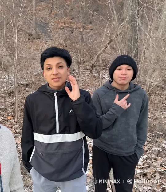 Two Individuals Walk Through Forest, Conjuring Flames – AI Generated Video | Hailuo AI