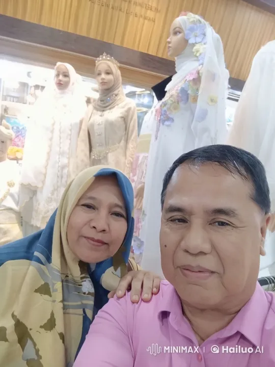 Couple Takes Selfie in Vibrant Traditional Clothing Shop – AI Generated Video | Hailuo AI