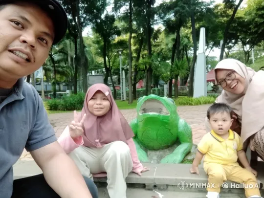 Family Practicing Kungfu Around Park Statue – AI Generated Video | Hailuo AI