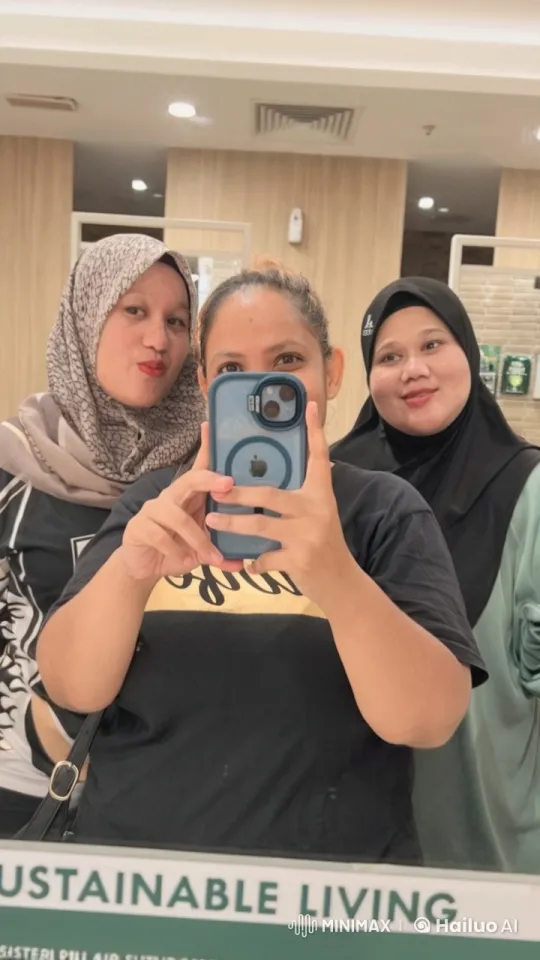Women Taking Selfie in Public Restroom Mirror – AI Generated Video | Hailuo AI