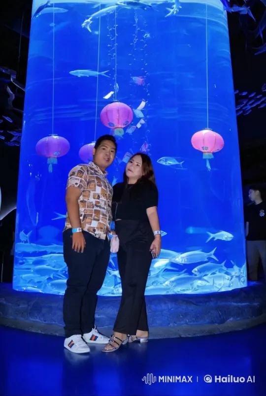Couple Performs Kungfu in Front of Aquarium – AI Generated Video | Hailuo AI