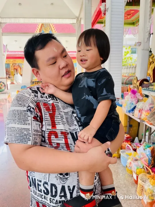Person in Newspaper T-Shirt and Child Practice Kung Fu in Temple – AI Generated Video | Hailuo AI