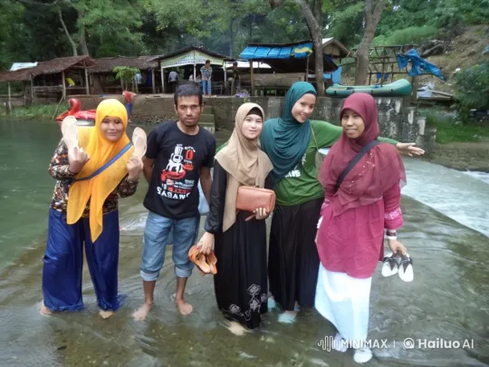 Group Enjoying Nature in a Shallow Stream – AI Generated Video | Hailuo AI