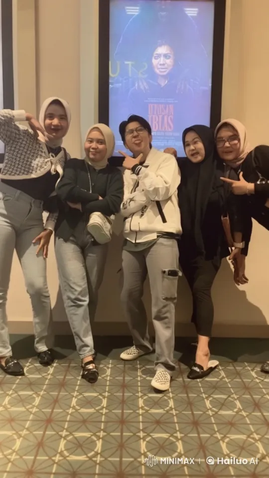 Friends Pose Playfully in Front of Movie Poster – AI Generated Video | Hailuo AI