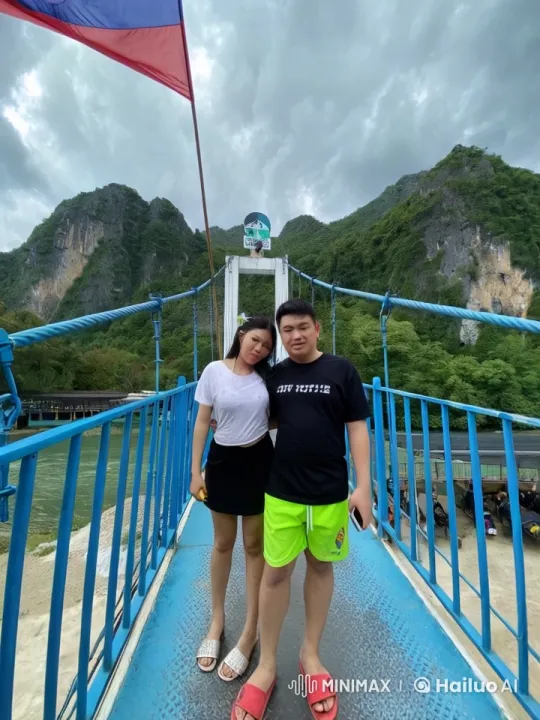 Couple Performs Martial Arts on Mountain Bridge – AI Generated Video | Hailuo AI