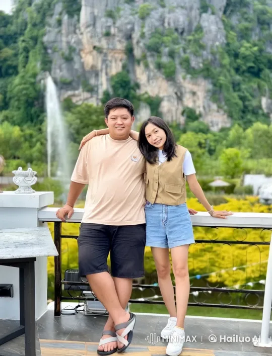 Couple Enjoying Playful Sparring on Scenic Balcony – AI Generated Video | Hailuo AI