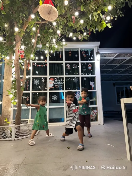 Festive Night with Playful Kids Under Christmas Tree – AI Generated Video | Hailuo AI