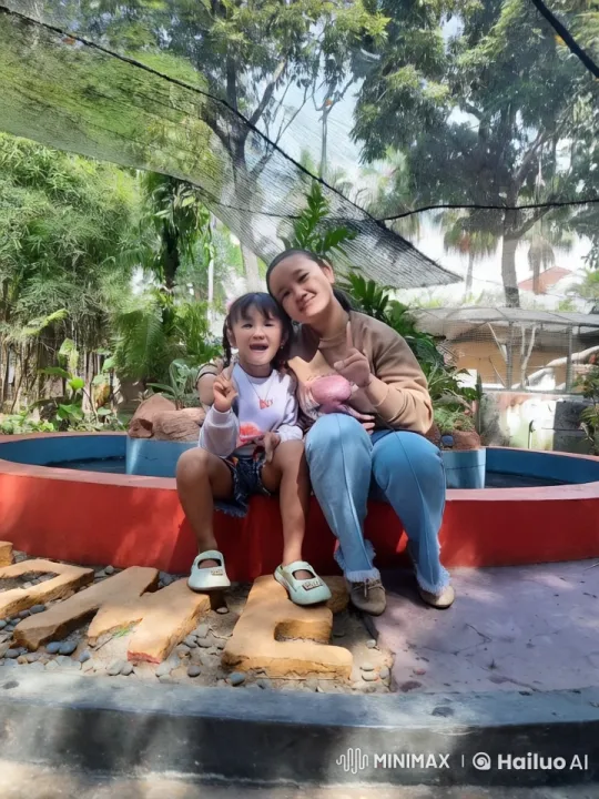 Woman and Child Enjoy Playful Martial Arts in Garden – AI Generated Video | Hailuo AI