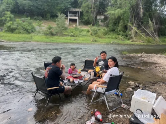 Family Enjoying Picnic by River Engages in Kung Fu Display – AI Generated Video | Hailuo AI