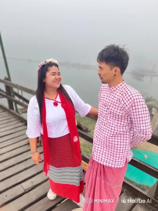 Traditional Attire Duel on Wooden Bridge Over Foggy River – AI Generated Video | Hailuo AI