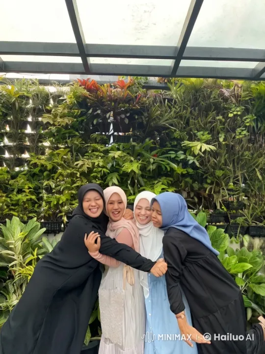 Hijab-Wearing Women Perform Martial Arts in Front of Green Wall – AI Generated Video | Hailuo AI