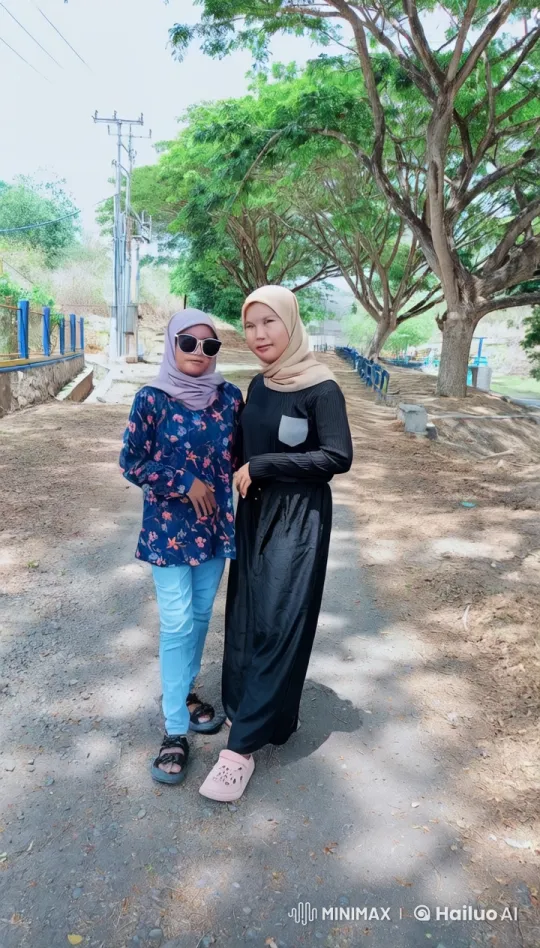 Kungfu Fight: Floral Shirt vs. Hijab in Sunny Path – AI Generated Video | Hailuo AI