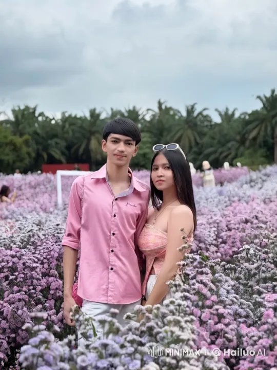 Couple Performs Synchronized Kung Fu in Serene Flower Field – AI Generated Video | Hailuo AI