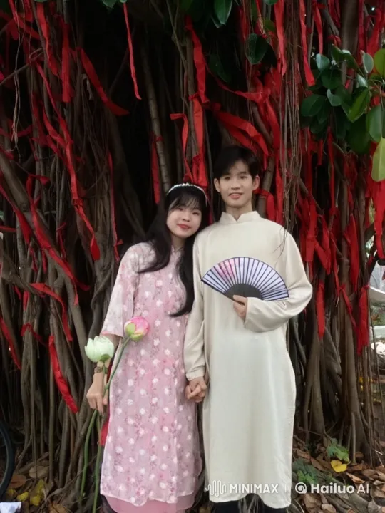 Traditional Attire Martial Arts Display with Fan and Lotus Flower – AI Generated Video | Hailuo AI