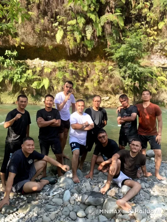 Kung Fu Masters Showcase Skills in Scenic Riverbank Sparring – AI Generated Video | Hailuo AI