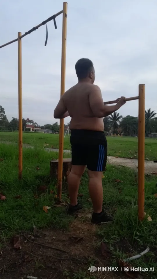 Man Prepares for Pull-Up in Park Setting – AI Generated Video | Hailuo AI