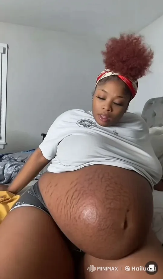 Title: "Man Rubbing Belly While Kneeling" – AI Generated Video | Hailuo AI
