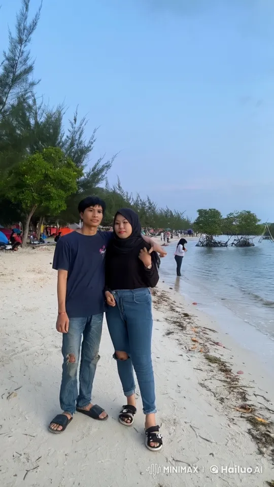 Couple Performs Energetic Kung Fu on Tranquil Beach – AI Generated Video | Hailuo AI