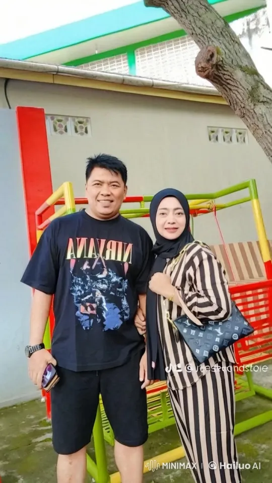 Nirvana T-Shirt Wearer and Hijabi Practicing Kung Fu at Swing Set – AI Generated Video | Hailuo AI