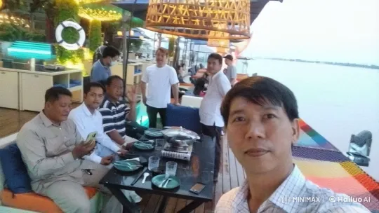 Outdoor Dining with Friends by the River – AI Generated Video | Hailuo AI