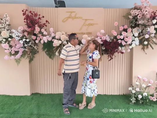 Couples' Tenderness Against Floral Backdrop – AI Generated Video | Hailuo AI