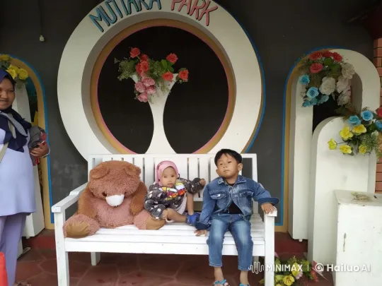 Children and Teddy Enjoy Serene Park Scene – AI Generated Video | Hailuo AI