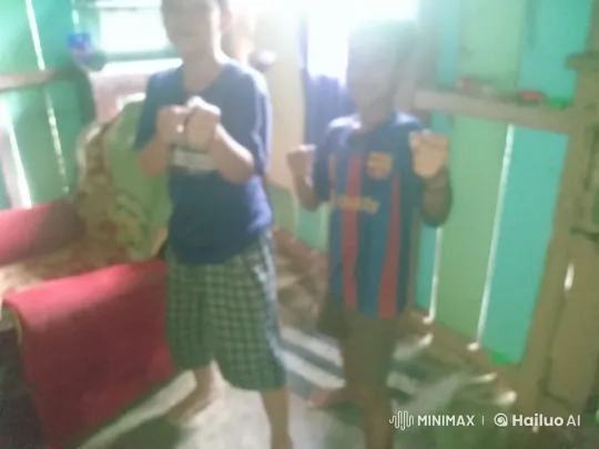 Two Children Playfully Mimicking Boxing in Cozy Room – AI Generated Video | Hailuo AI