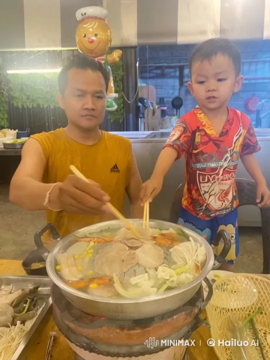 Father and Child Bond Over Energetic Hot Pot Cooking – AI Generated Video | Hailuo AI