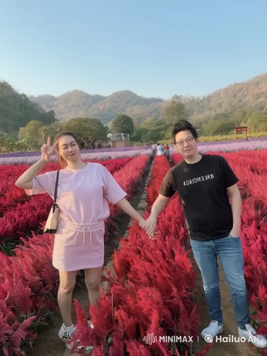 Young Couple Engages in Graceful Kung Fu Fight in Flowered Meadow – AI Generated Video | Hailuo AI