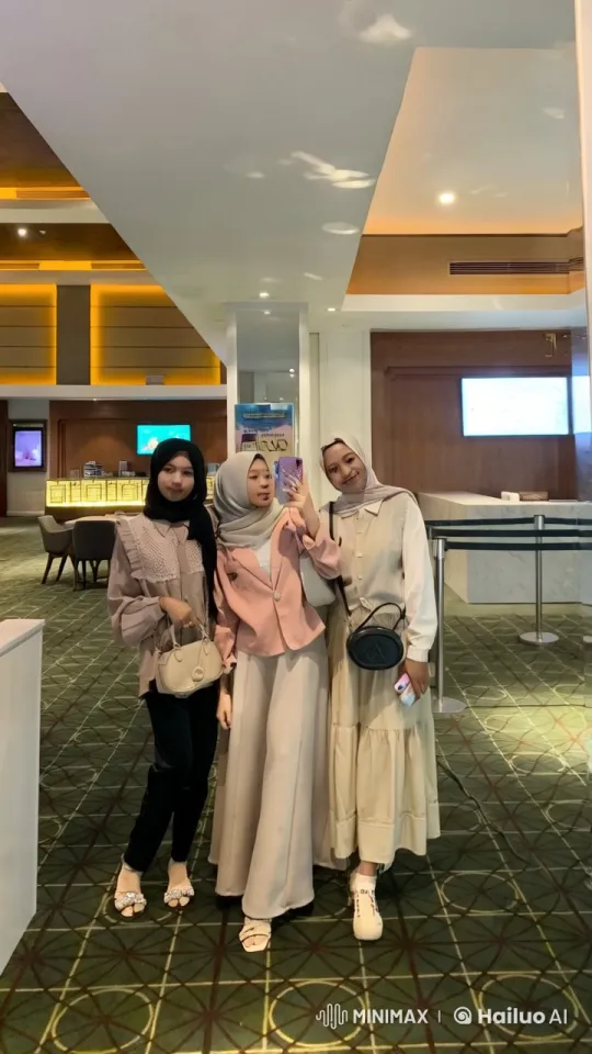 Three friends perform kungfu in a modern lobby – AI Generated Video | Hailuo AI