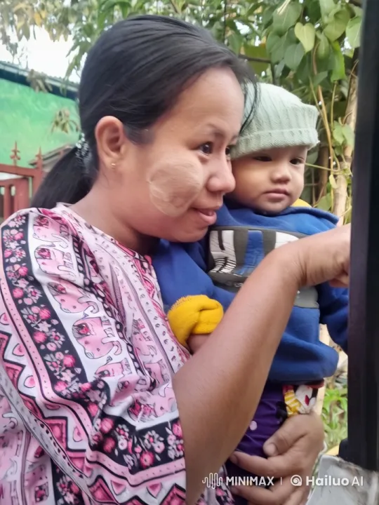 Woman Bounces Child Outdoors in Serene, Engaging Moment – AI Generated Video | Hailuo AI