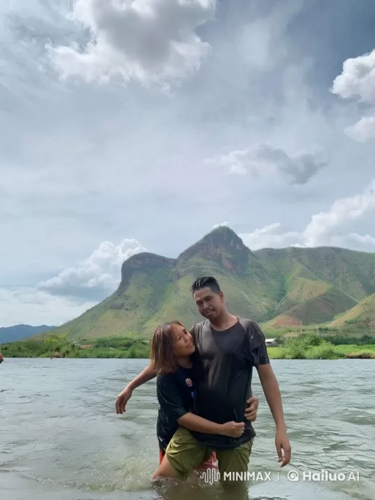 Kung Fu Practitioners Engage in Dynamic Battle Amidst Serene Mountain River Setting – AI Generated Video | Hailuo AI