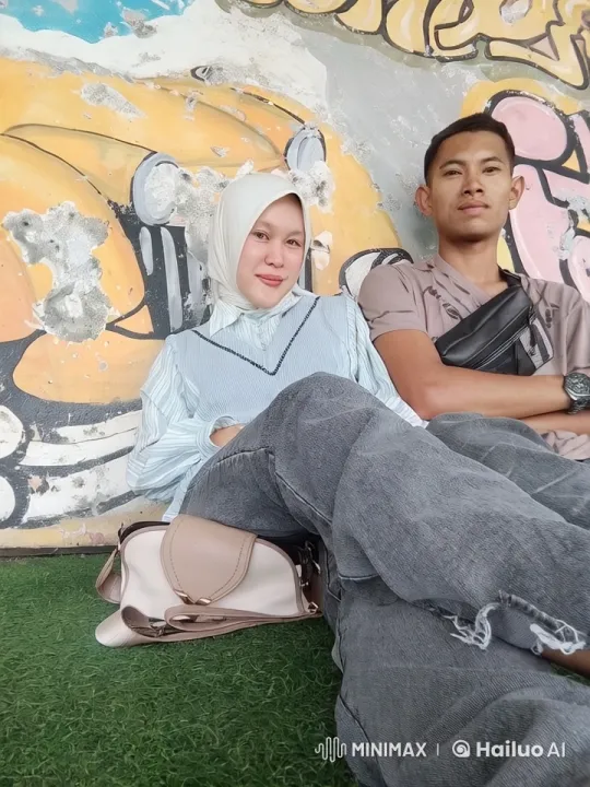 Couple Performs Impressive Kung Fu Moves in Front of Mural – AI Generated Video | Hailuo AI