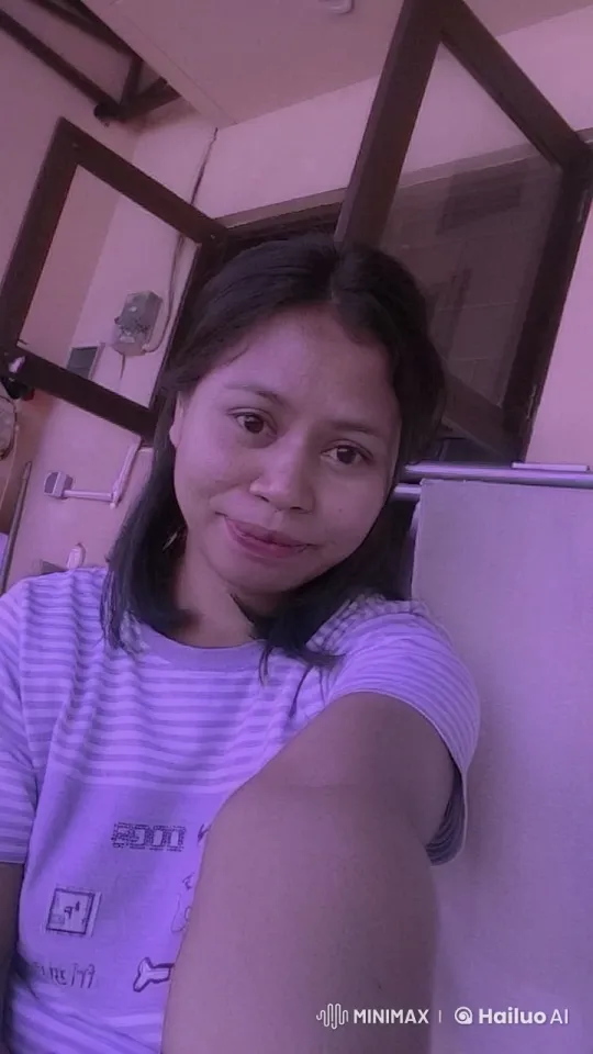 Casual Woman in Beige Room with Striped Shirt – AI Generated Video | Hailuo AI