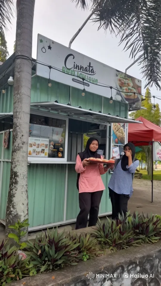 Young Women Perform Martial Arts at 'Cinnata' Food Stall – AI Generated Video | Hailuo AI