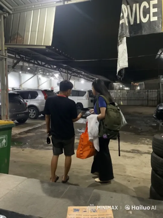 Couple Engages in Warm Conversation at Night Service Station – AI Generated Video | Hailuo AI