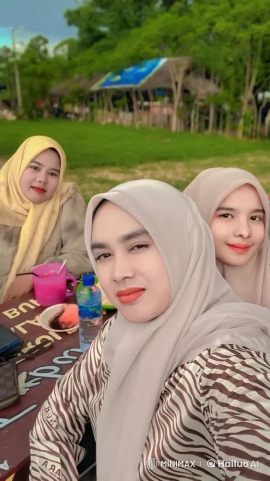 Hijab-wearing women perform kungfu in tranquil outdoor setting – AI Generated Video | Hailuo AI