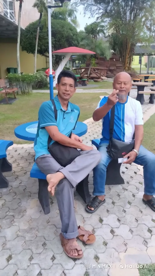 Two Men Relaxing on Benches in Scenic Park – AI Generated Video | Hailuo AI