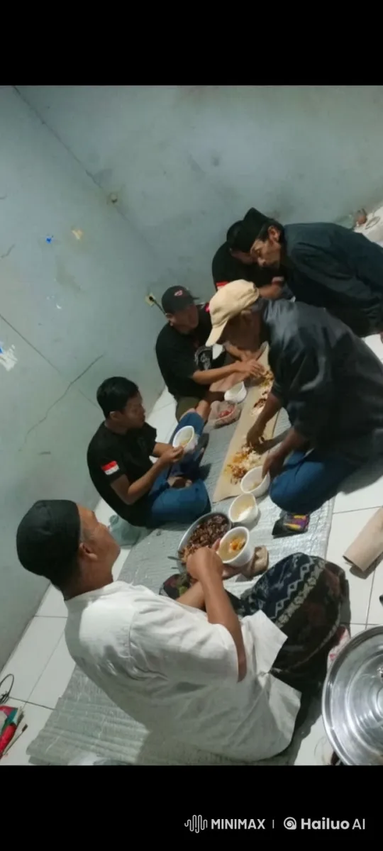 Kung Fu Display Amidst Communal Meal in Plain Room – AI Generated Video | Hailuo AI