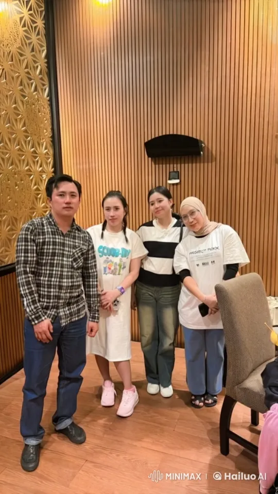 Group Photo in a Decorated Room with Varied Attire – AI Generated Video | Hailuo AI