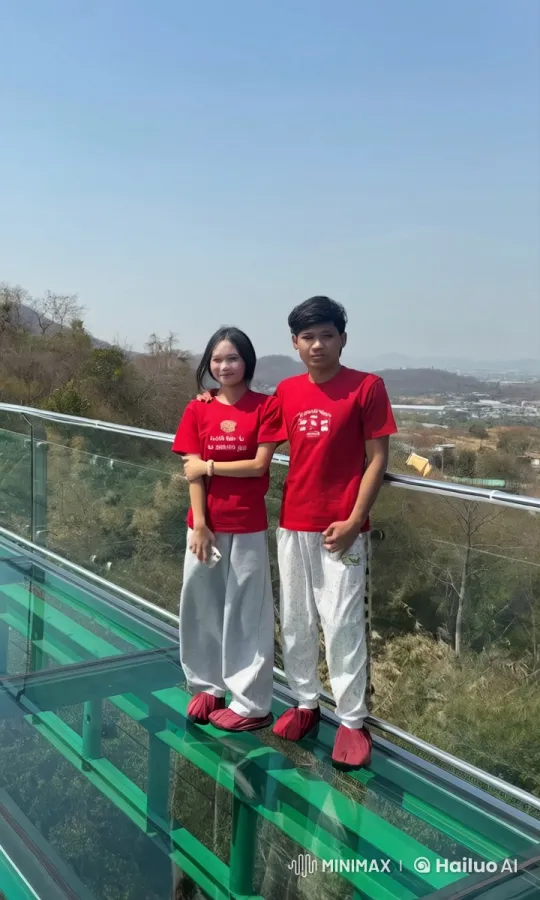 Couple Performs Martial Arts on Scenic Glass Bridge – AI Generated Video | Hailuo AI