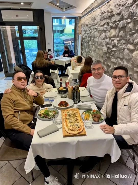 Friends Enjoying Lunch in Cozy Restaurant – AI Generated Video | Hailuo AI