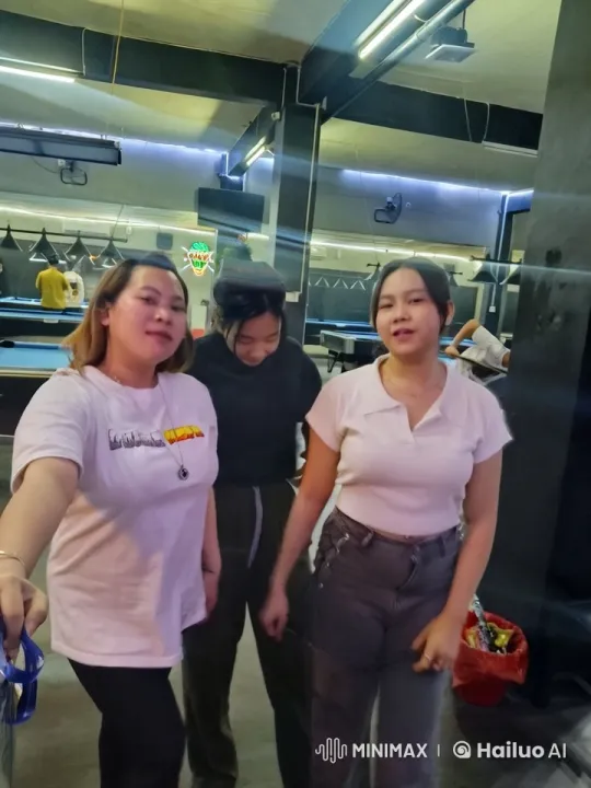 Friends Enjoy Playful Sparring in Billiards Hall – AI Generated Video | Hailuo AI