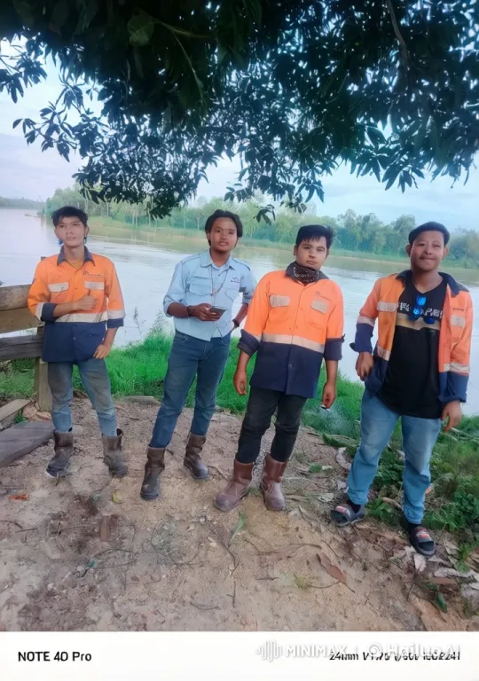 Young Men Chatting by the Riverbank – AI Generated Video | Hailuo AI